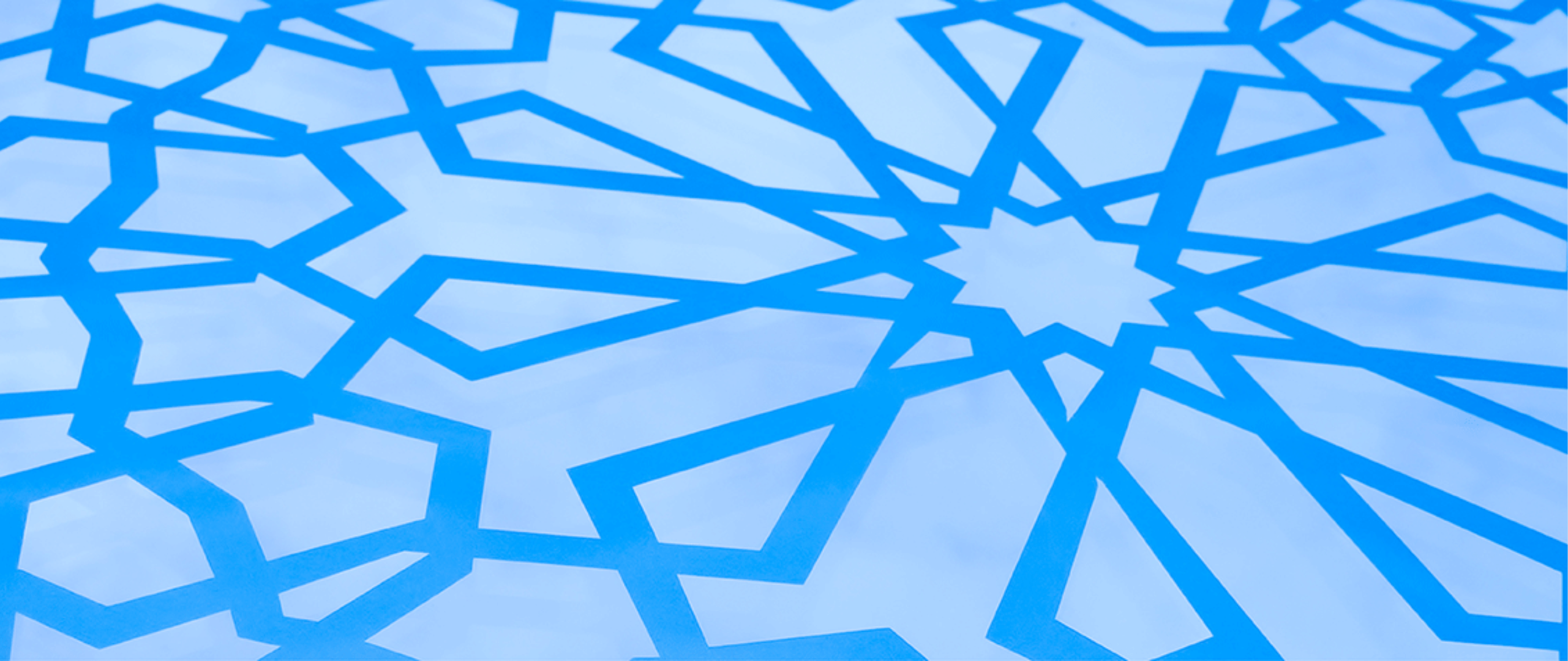 Geometric Islamic pattern forming repeated star and line shapes across the background surface.