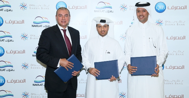 Photo showing financing deal signing event.