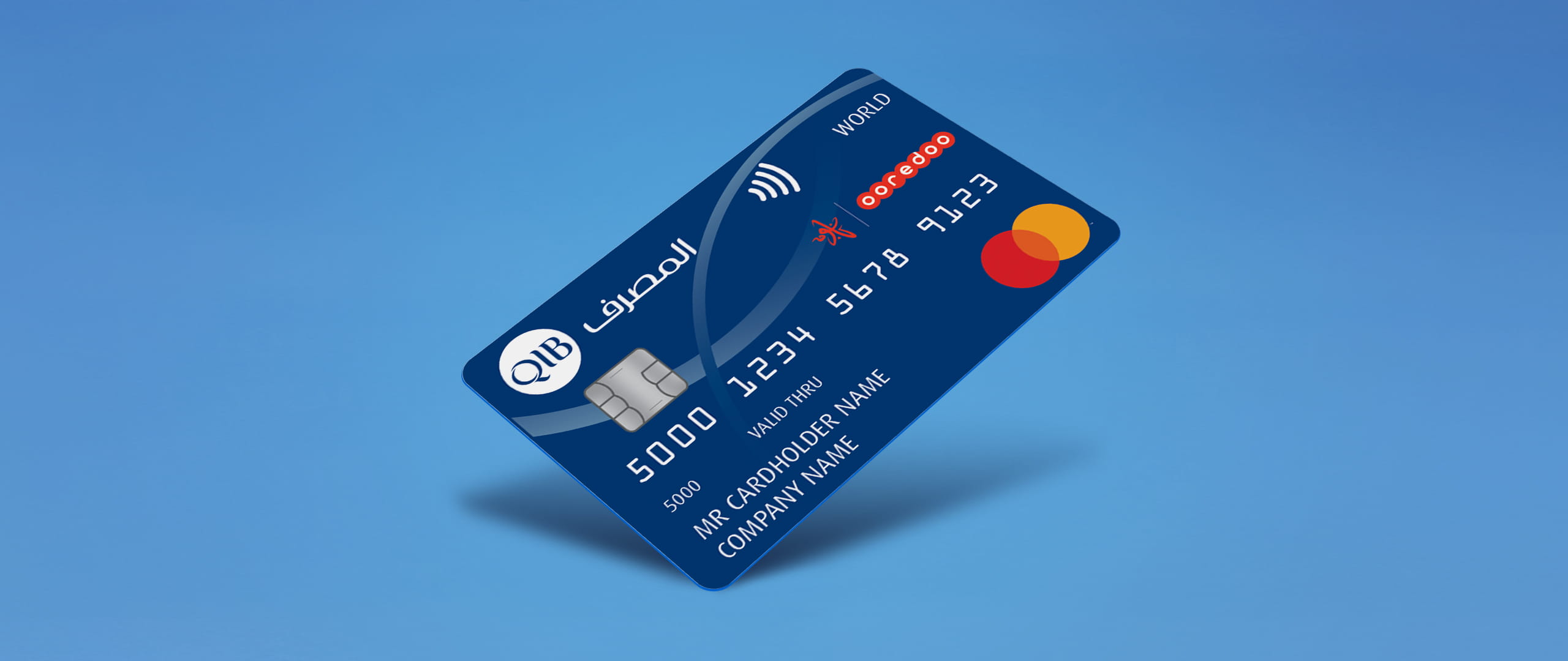 Corporate payment card placed on a plain background showing card details and contactless symbol.