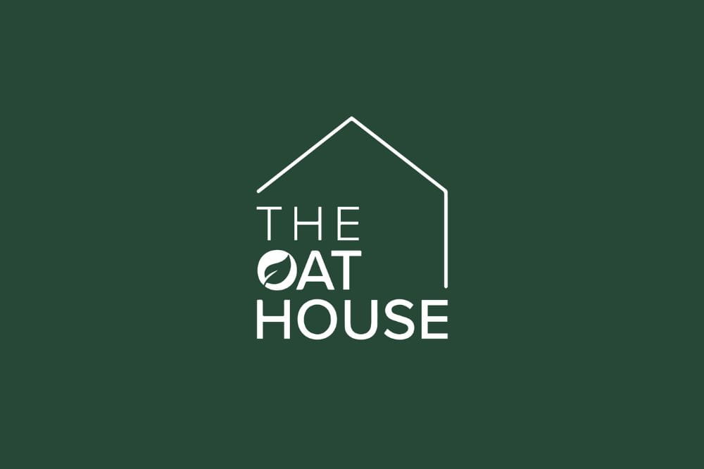 Restaurant logo displaying The Oat House name.