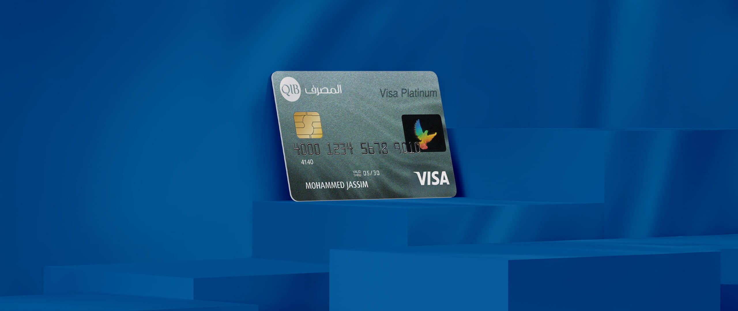 Two payment cards displayed on stepped platforms.
